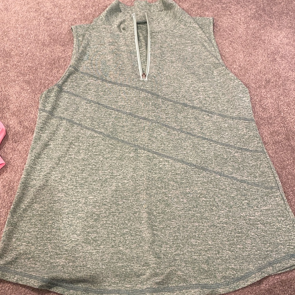 Sleeveless size large ladies, golf shirt